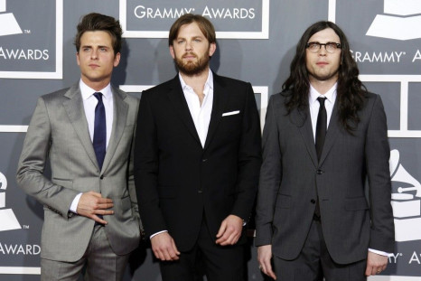 Rock band Kings of Leon pose on arrival at the 53rd annual Grammy Awards in Los Angeles, California