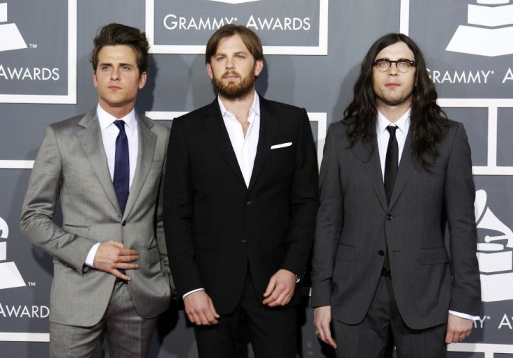 Rock band Kings of Leon pose on arrival at the 53rd annual Grammy Awards in Los Angeles, California