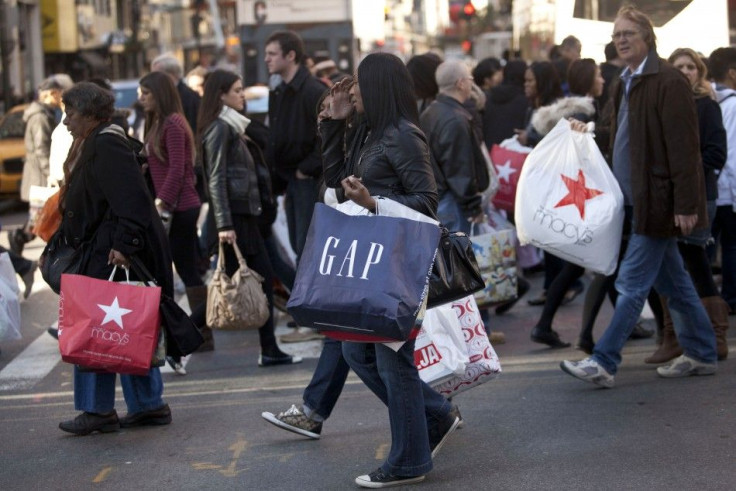 Black Friday shoppers cross 34th street, in Herald Square, in New York