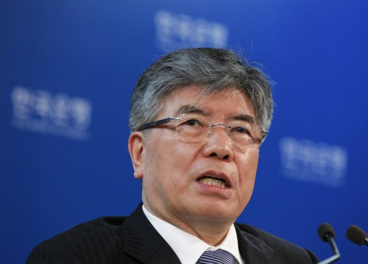 The Bank of Korea governor Kim answers a reporter&#039;s question during a news conference after a rate setting meeting at the bank&#039;s headquarters in Seoul