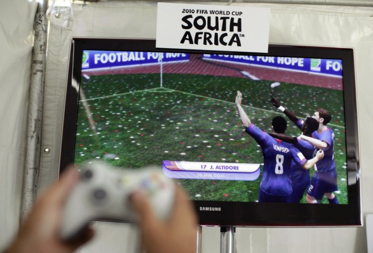 A person plays the EA Sports 2010 FIFA World Cup South Africa video game in Los Angeles