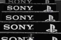 Logos of Sony Corp and PlayStation are seen at an electronics store in Tokyo