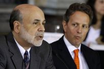 U.S. Treasury Secretary Geithner listens to Chairman of the Federal Reserve Bernanke in Washington