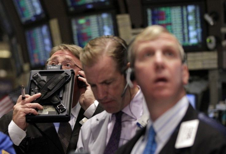 Traders work on the floor of the New York Stock Exchange