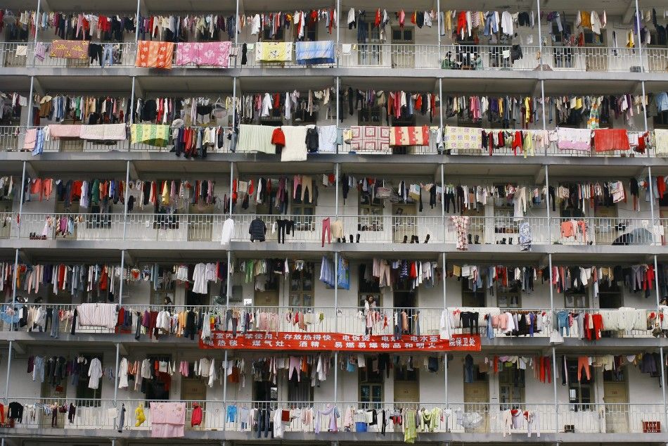 Laundry hangs outside a student dormitory at a college in Wuhan