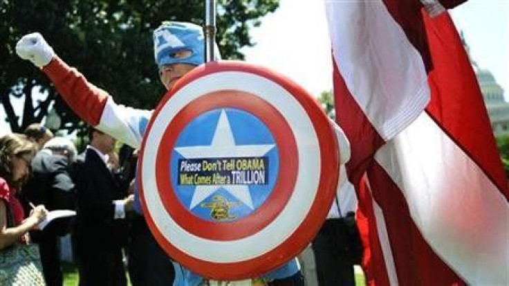 A man dressed as Captain America​ poses as dozens of Tea Party supporters rally