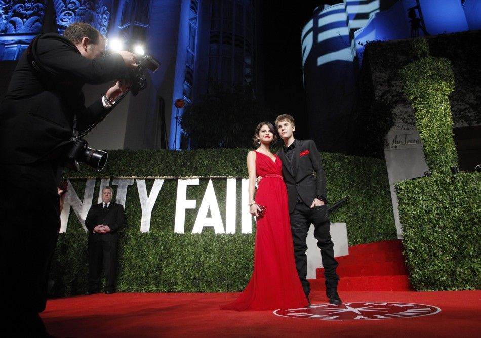 Justin Bieber and Selena Gomez arrive at the Vanity Fair Oscar party in West Hollywood