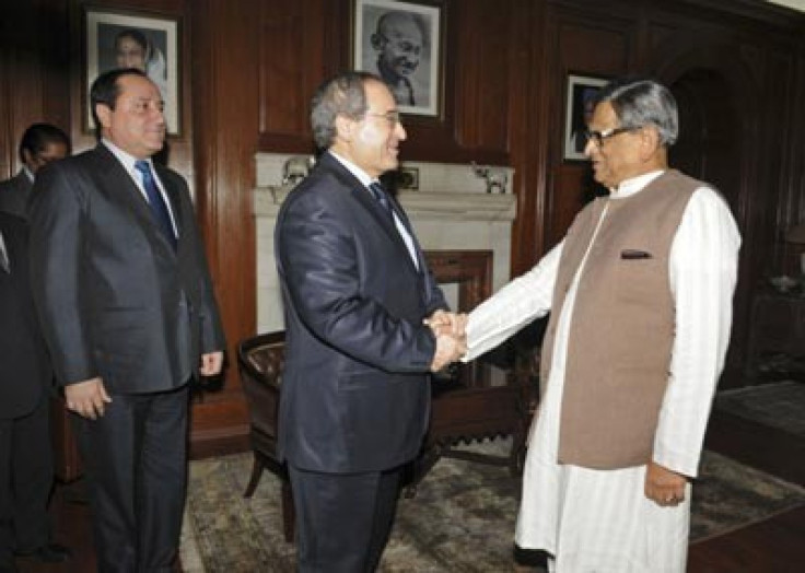 Syrian foreign minister Mekdad meets with Indian counterpart Krishna.