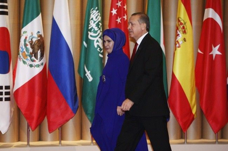 Turkey's Prime Minister Tayyip Erdogan and his wife Emine Erdogan arrive for a reception at the G20 summit in Seoul November 11, 2010.