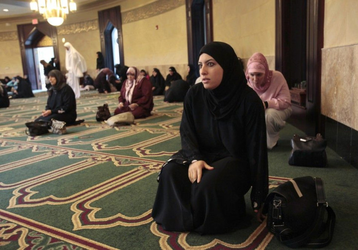 Lamis Ali, 29, arrives for afternoon prayers at the Islamic Center of America in Dearborn