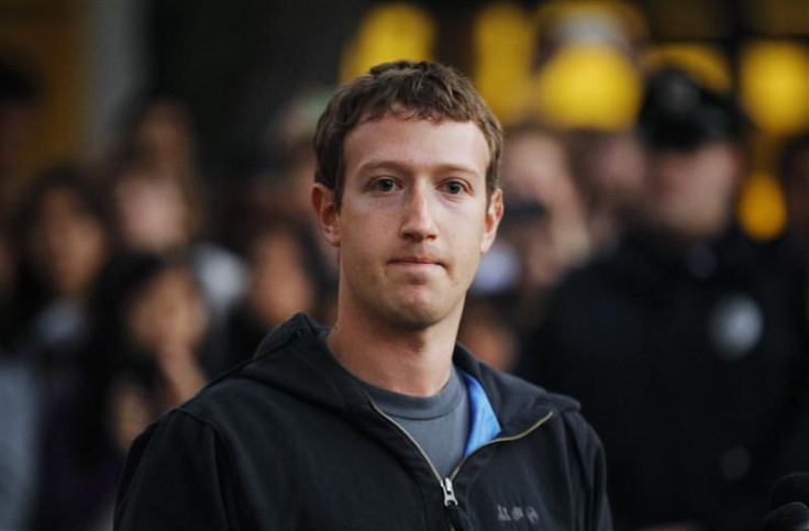 Mark Zuckerberg speaks to reporters at Harvard University in Cambridge