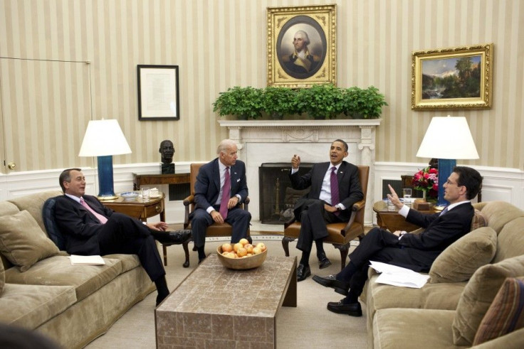 President Barack Obama and Vice President Joe Biden meet with House Speaker John Boehner and House Majority Leader Eric Cantor in the Oval Office at the White House in Washington