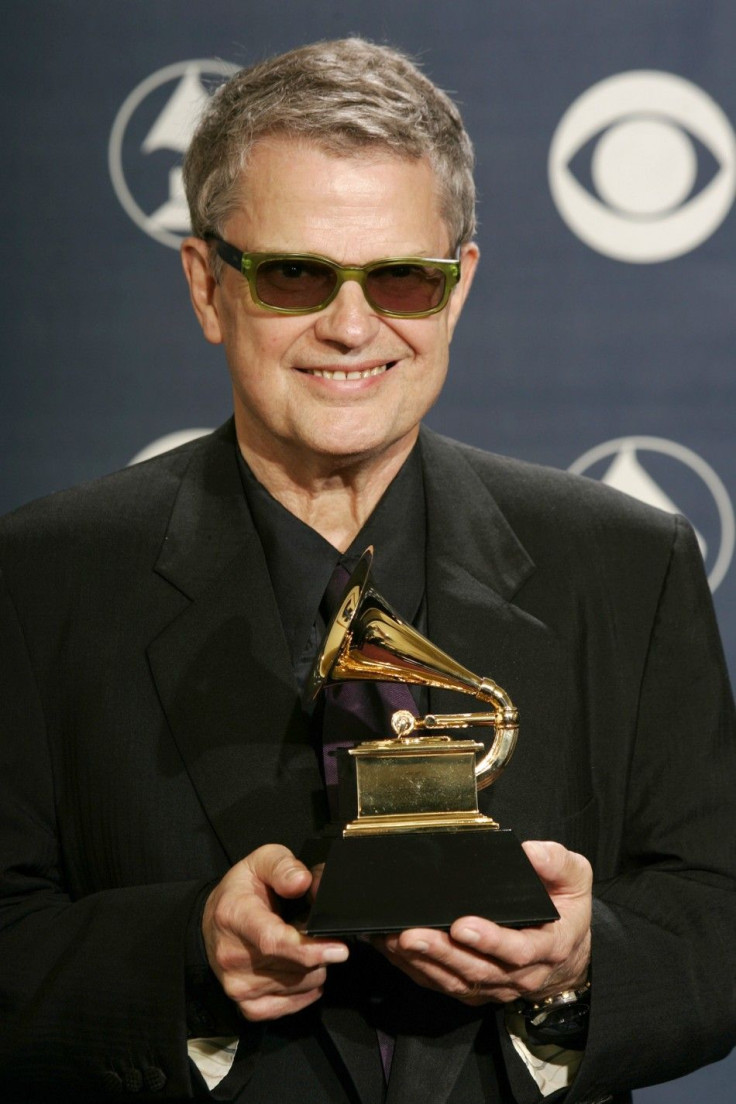 Charlie Haden poses backstage with his award at the 47th annual Grammy Awards.