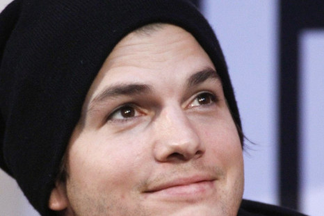 Ashton Kutcher reacts during an interview in a shopping centre in Pasching some 180 kilometres (some 112 miles) west of Vienna