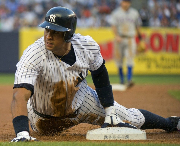 New York Yankees Alex Rodriguez steals third base against Texas Rangers in New York