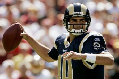 St. Louis Rams quarterback Bulger throws against the Washington Redskins defense in the second half of their NFL football game in Landover Maryland