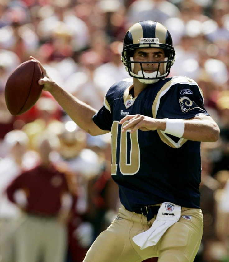 St. Louis Rams quarterback Bulger throws against the Washington Redskins defense in the second half of their NFL football game in Landover Maryland