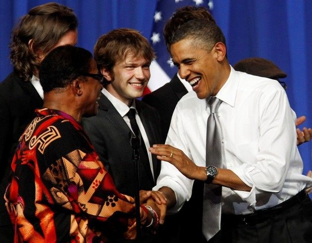 US President Obama is greeted by Herbie Hancock at a DNC event in Chicago