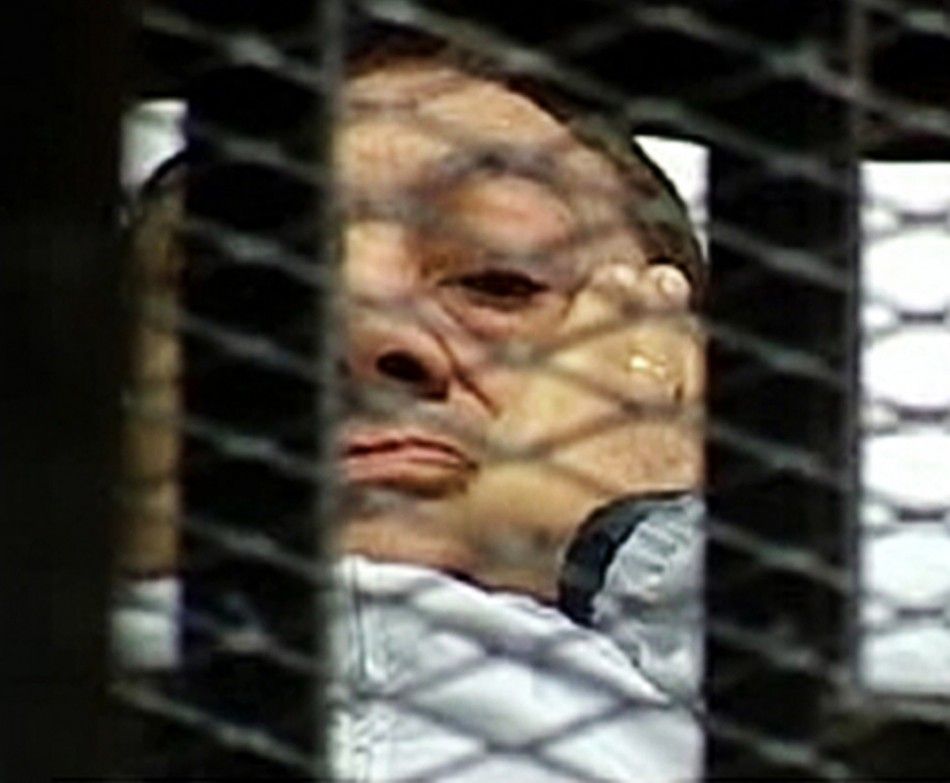 Hosni Mubarak is seen in the courtroom for his trial at the Police Academy in Cairo in this still image taken from video