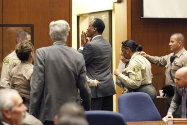 Dr. Conrad Murray blows a kiss to an unidentified member of the courtroom audience after he was sentenced to four years in county jail for his involuntary manslaughter conviction of pop star Michael Jackson