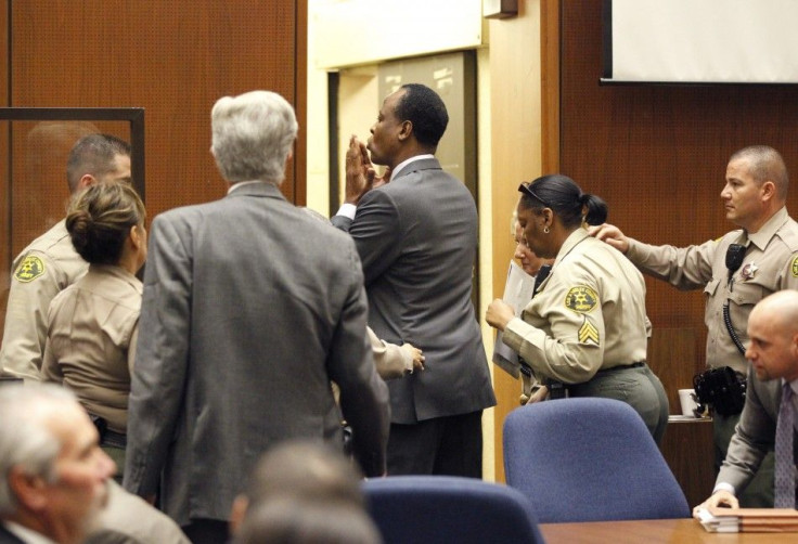 Dr. Conrad Murray blows a kiss to an unidentified member of the courtroom audience after he was sentenced to four years in county jail for his involuntary manslaughter conviction of pop star Michael Jackson