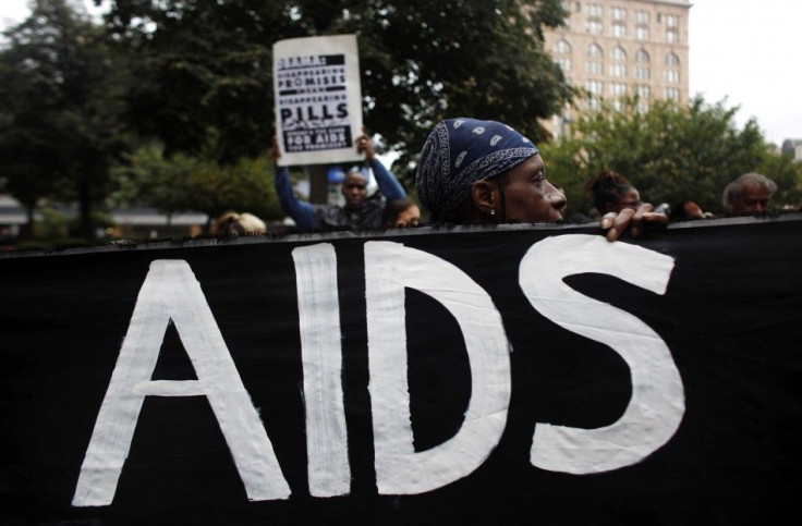 AIDS activists demonstrate with mock coffins near the site of the upcoming G20 Summit in Pittsburgh