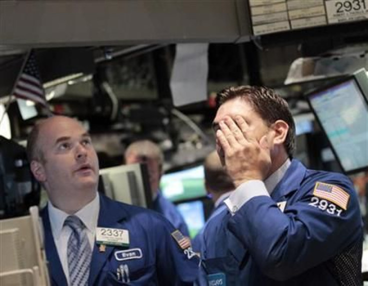 Traders work on the floor of the New York Stock Exchange