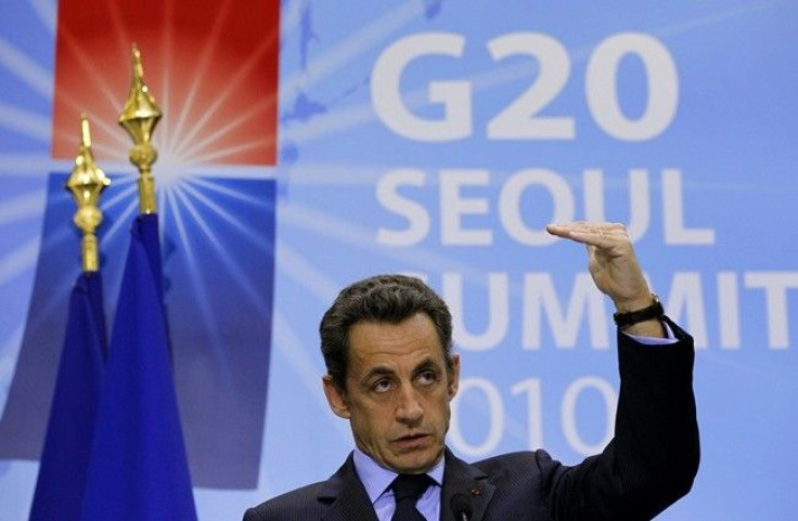 France's President Nicolas Sarkozy gestures as he addresses a news conference during the G20 summit in Seoul, November 12, 2010.