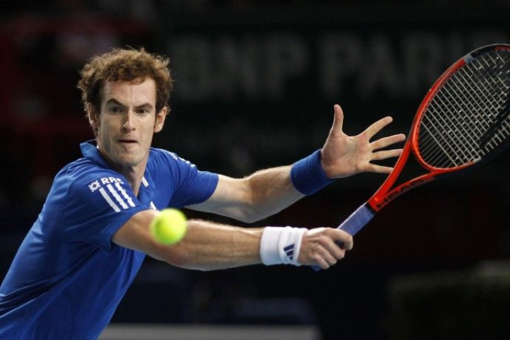 Andy Murray of Britain returns the ball to Croatia's Marin Cilic during their Paris Masters tennis tournament match.
