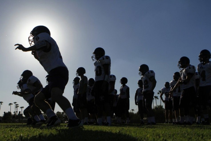 The McClintock HIgh School Chargers football team practice for their upcoming season in Tempe