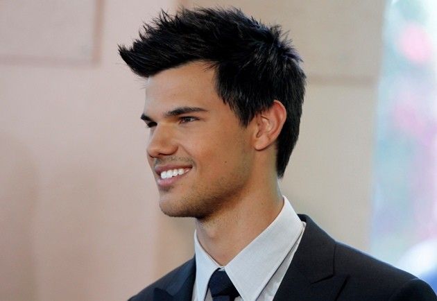 Actor Taylor Lautner arrives at the Hollywood Foreign Press Association annual installation luncheon in Beverly Hills 