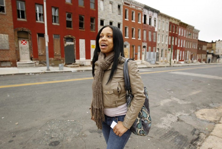 Youth Opportunity (YO!) Academy student Samira Gardner, 20, in a street outside the Westside Youth Opportunity Community Center in Baltimore