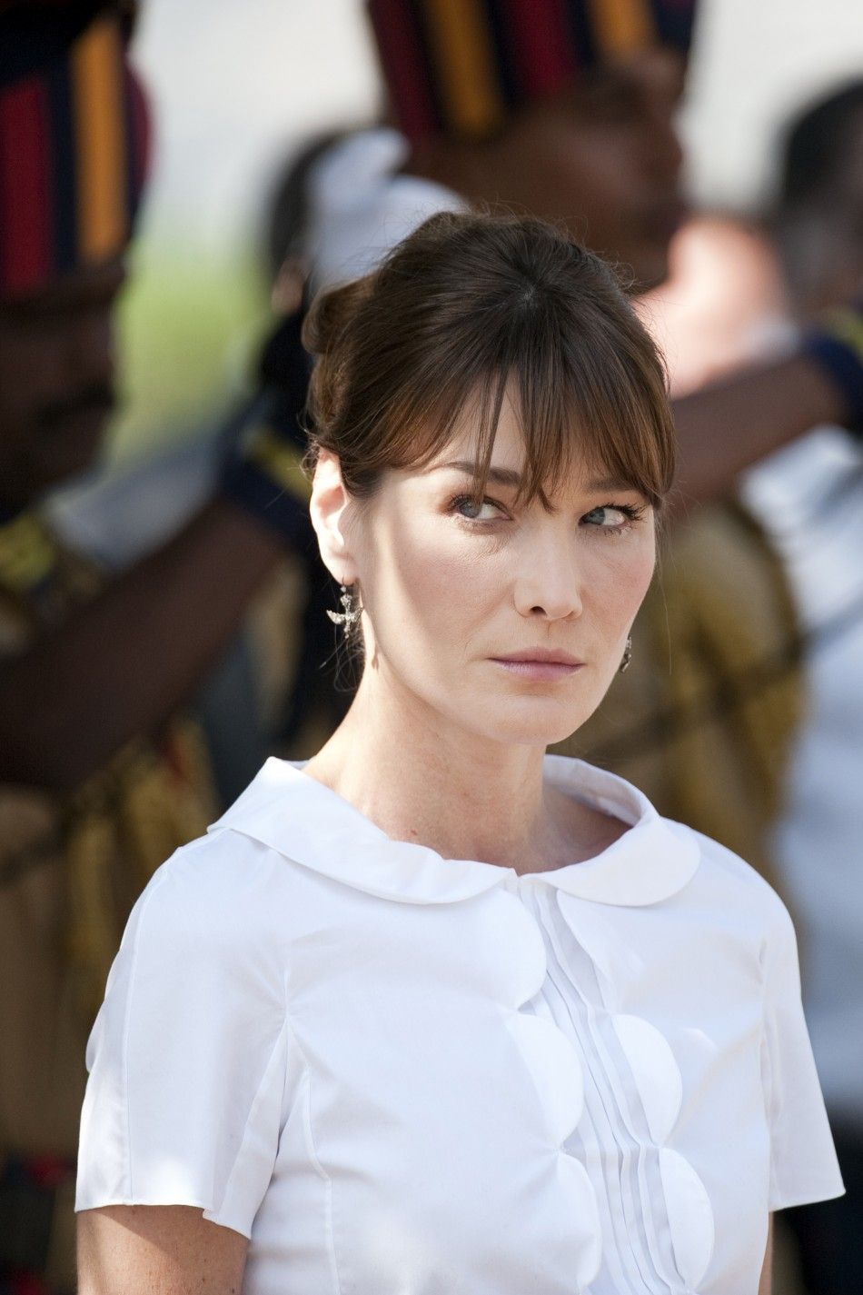 French first lady Carla Bruni-Sarkozy attends a ceremony at the Gymkhana police memorial commemorating the November 2008 terror attacks in Mumbai