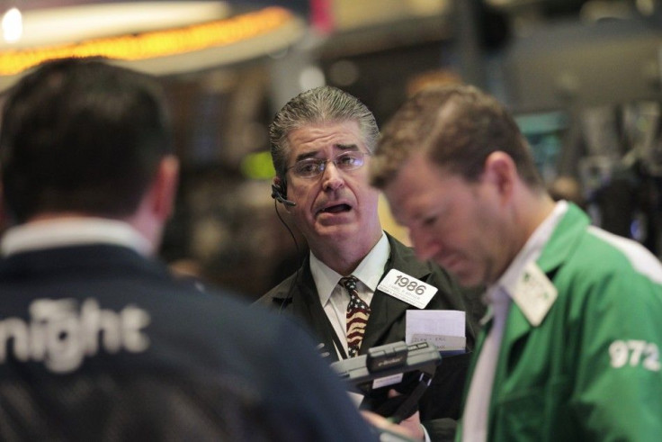 Traders work on the floor of the New York Stock Exchange