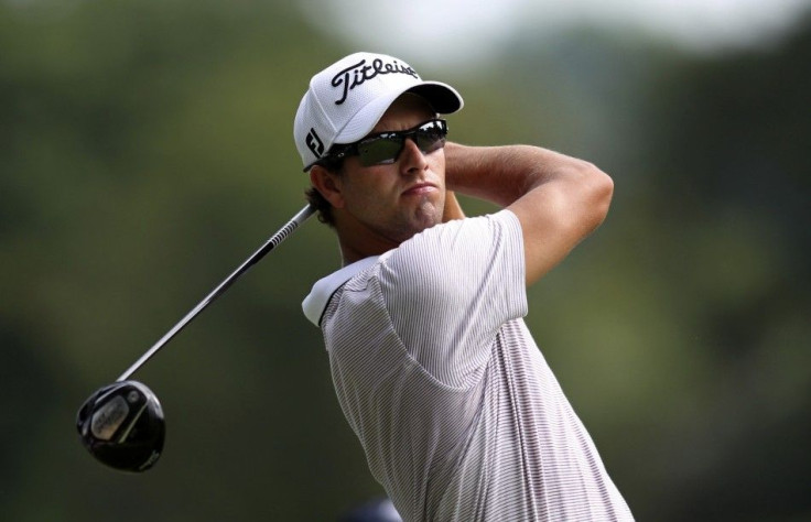 Australia&#039;s Adam Scott tees off on the 11th hole during the second round of the WGC Bridgestone Invitational PGA golf tournament at Firestone Country Club in Akron