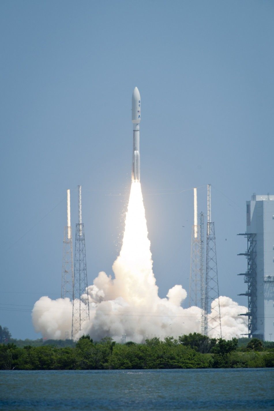 An Atlas V rocket launches with the Juno spacecraft payload from Space Launch Complex 41 at Cape Canaveral Air Force Station in Florida