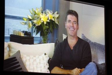 Simon Cowell, one of the judges on new reality series &#039;The X Factor&#039;, speaks via satellite at the FOX Summer TCA Press Tour in Beverly Hills
