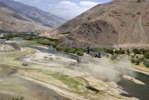 U.S. Chinook helicopters leave after a security handover ceremony in Panjshir province