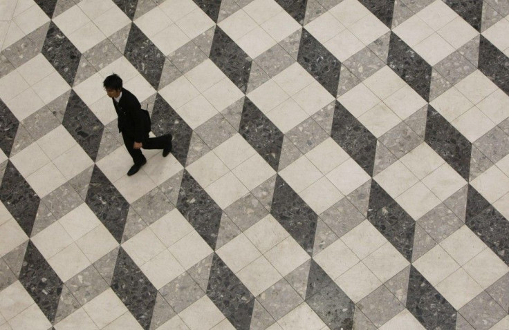 A man walks in a building in Tokyo January 28, 2010.