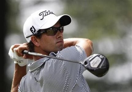 Australia's Adam Scott tees off on the 18th hole during the third round of the WGC Bridgestone Invitational PGA golf tournament at Firestone Country Club in Akron