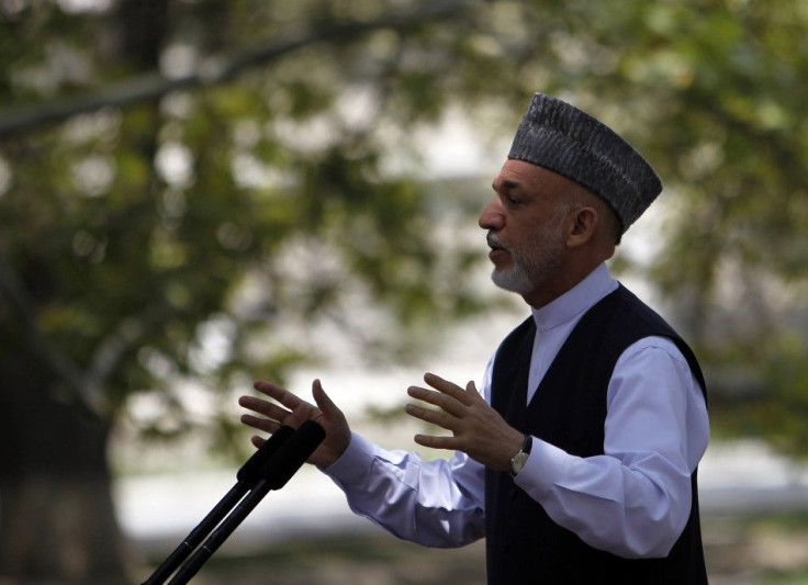 Afghanistan&#039;s President Hamid Karzai speaks during a gathering with military personnel at the presidential palace in Kabul