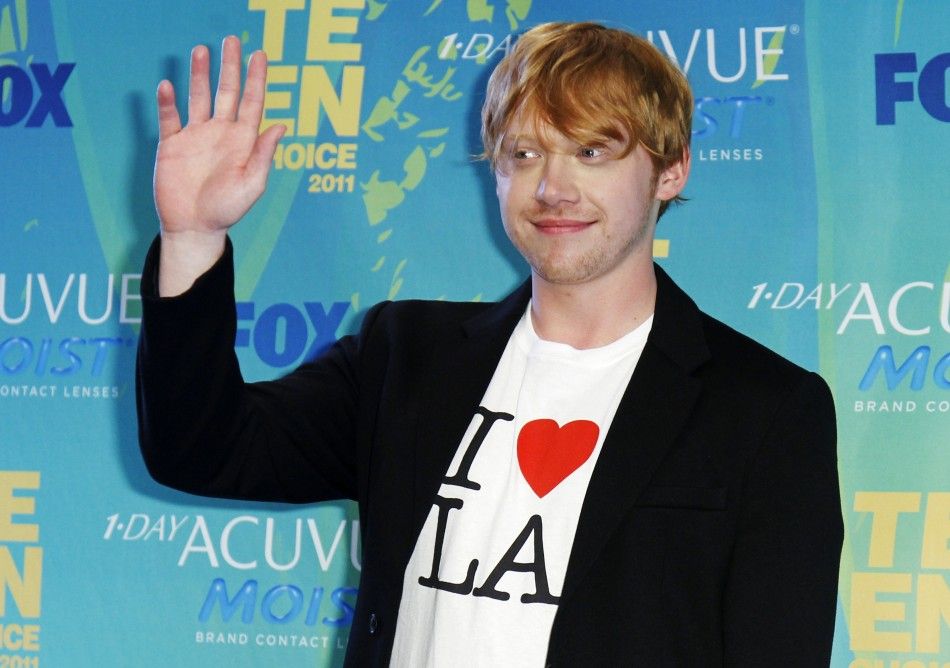 British actor Rupert Grint poses in the press room backstage wearing an quotI Love L.A.quot t-shirt at the Teen Choice Awards in Los Angeles
