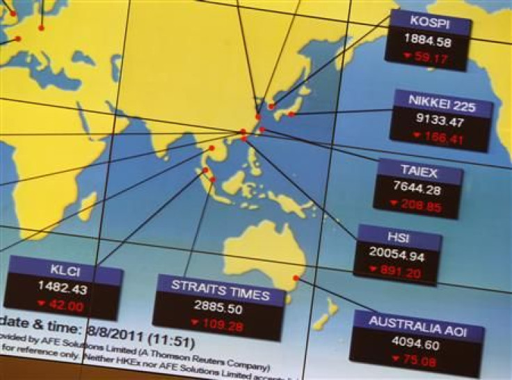 A panel displays stock indexes of Asian markets at an exhibition hall of the Hong Kong Stock Exchange