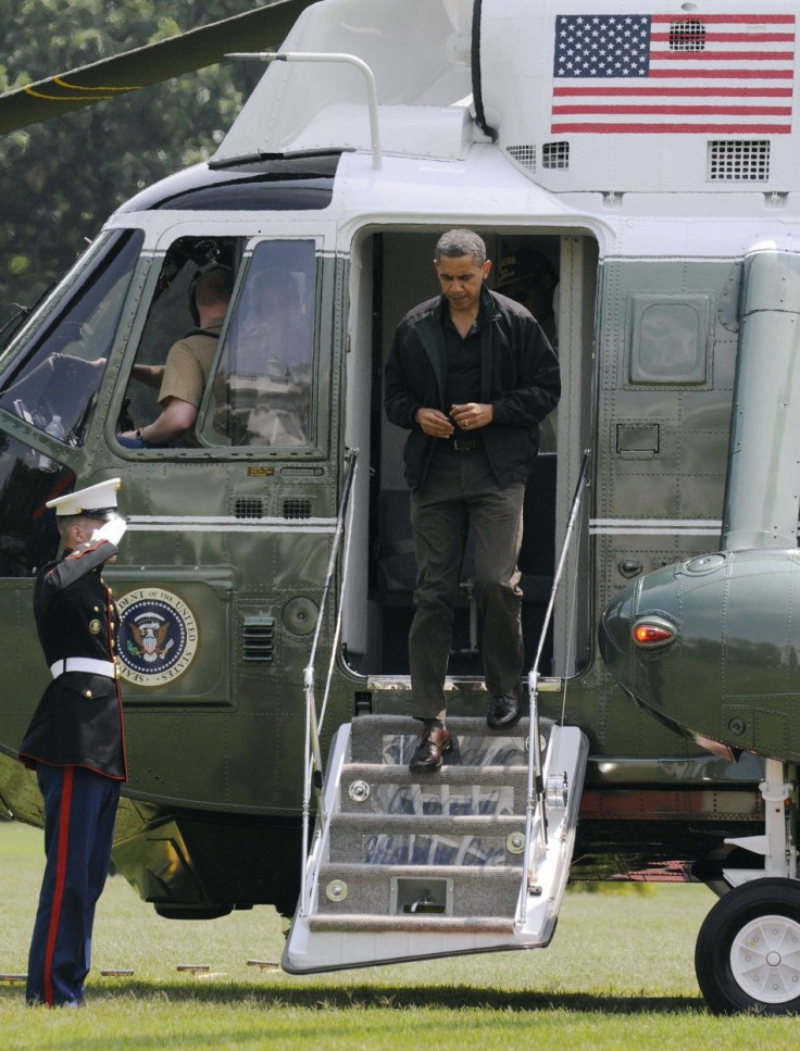 U.S. President Obama returns from a family visit at Camp David to the White House in Washington