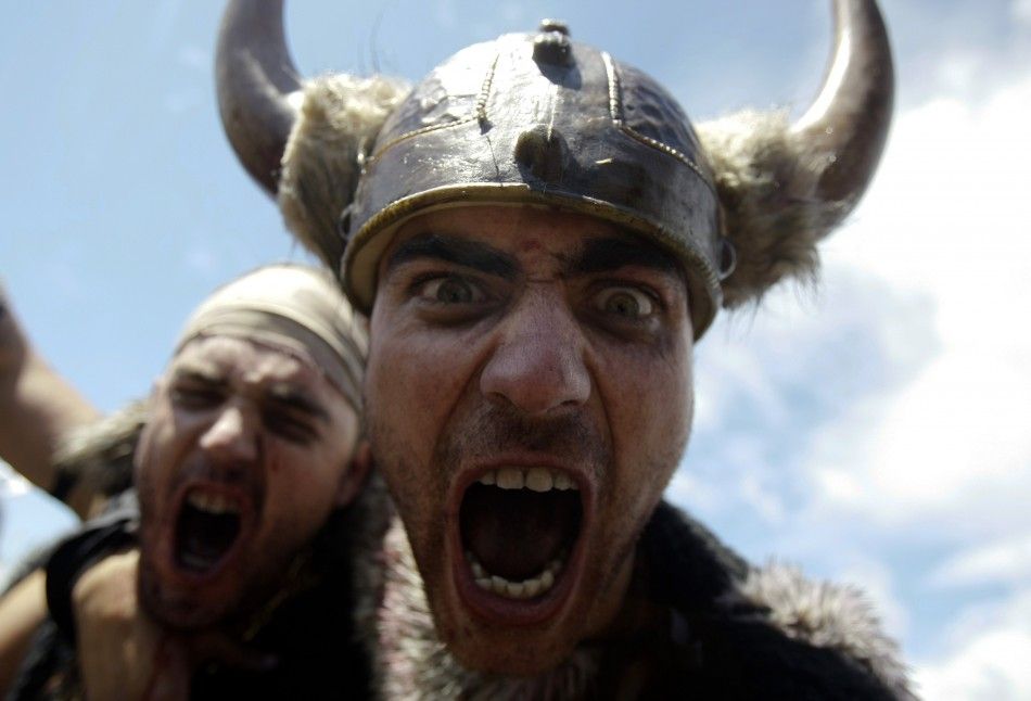 Men dressed up as Vikings take part in the annual Viking festival of Catoira in north-western Spain