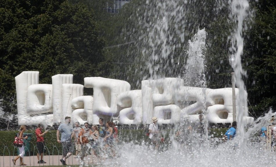 Music fans make their way through the grounds at the Lollapalooza music festival in Grant Park in Chicago