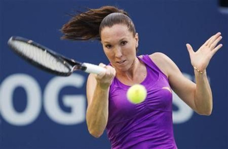 Jelena Jankovic of Serbia returns a shot to Julia Goerges of Germany during their match at the Rogers Cup women&#039;s tennis tournament in Toronto