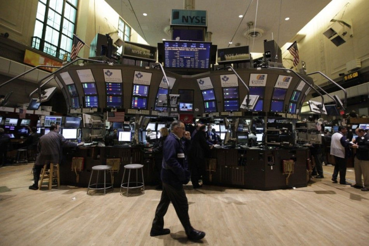 Traders work on the floor of the New York Stock Exchange