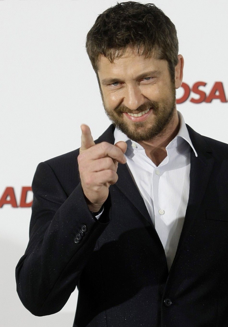 Actor Butler poses during a photocall to promote the movie The Bounty Hunter in Madrid