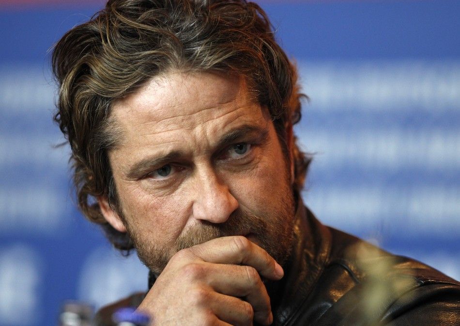 Actor Butler attends news conference at the 61st Berlinale International Film Festival in Berlin